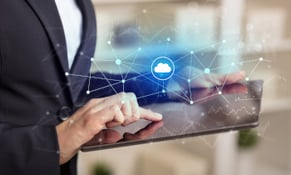 Business woman holding and using tablet