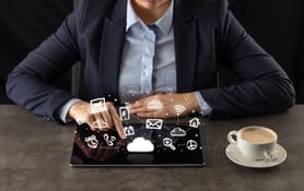 business person using computer tablet